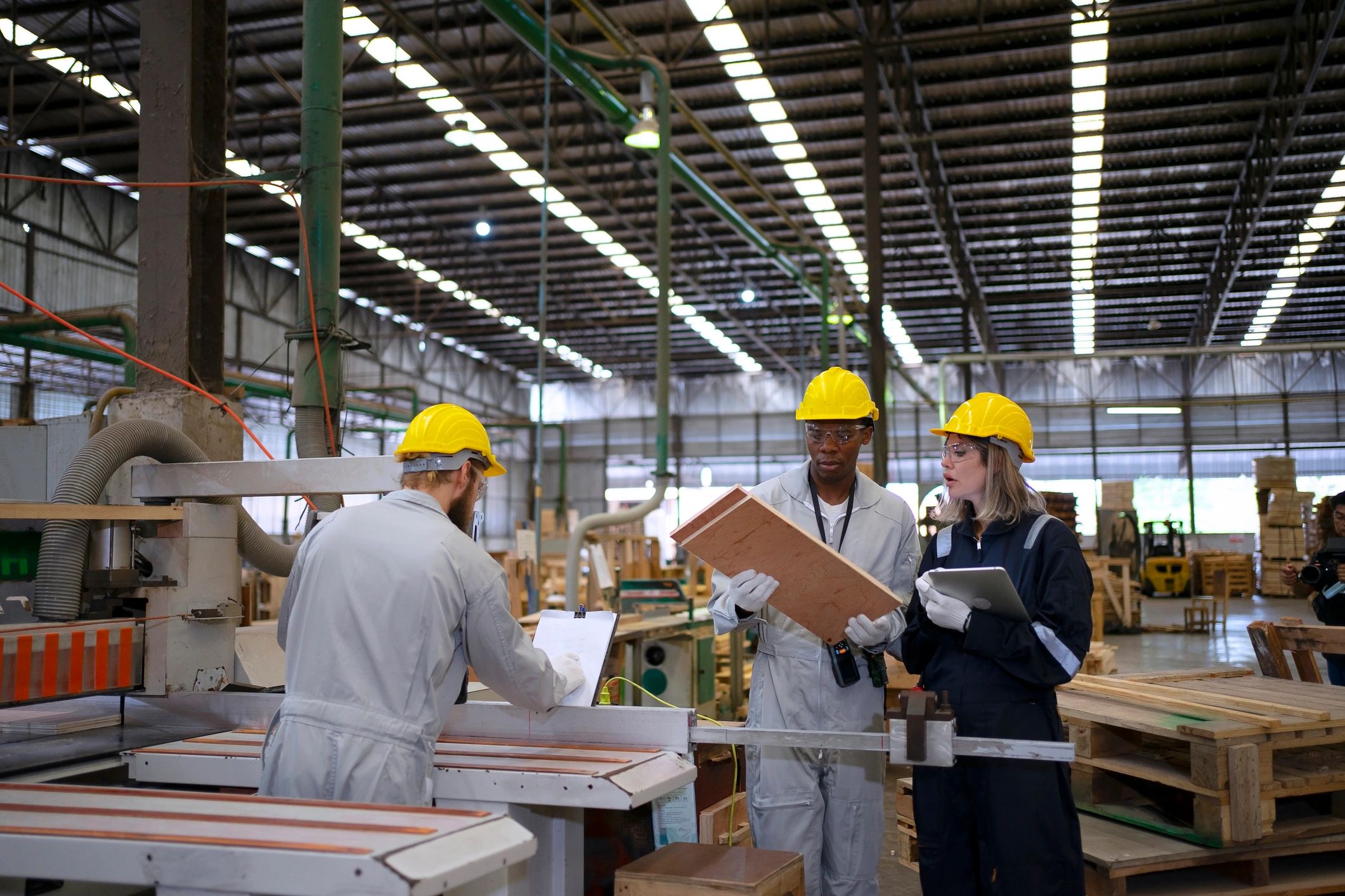 Blue collar workers in a warehouse setting