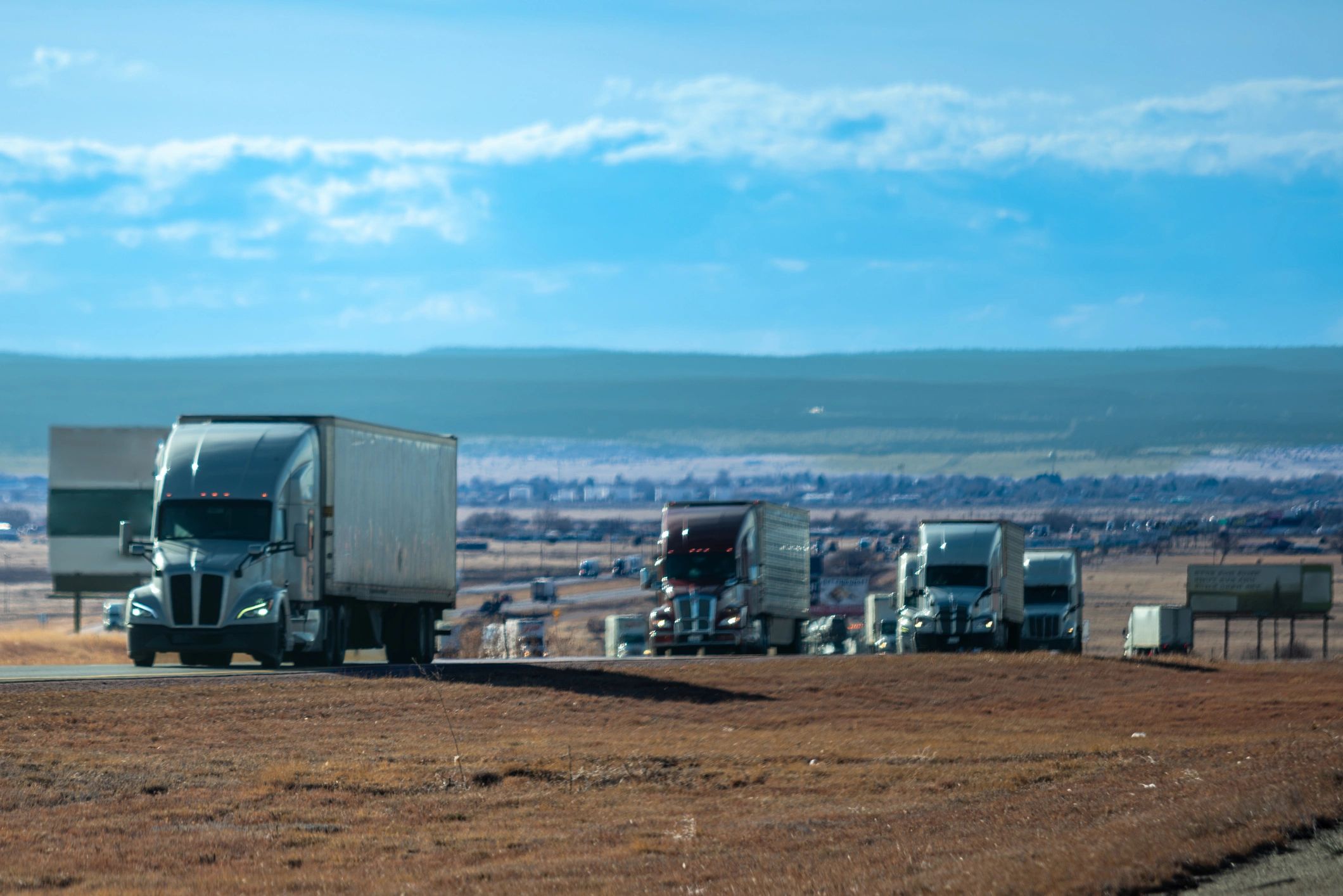Commercial fleet vehicles parked in a row