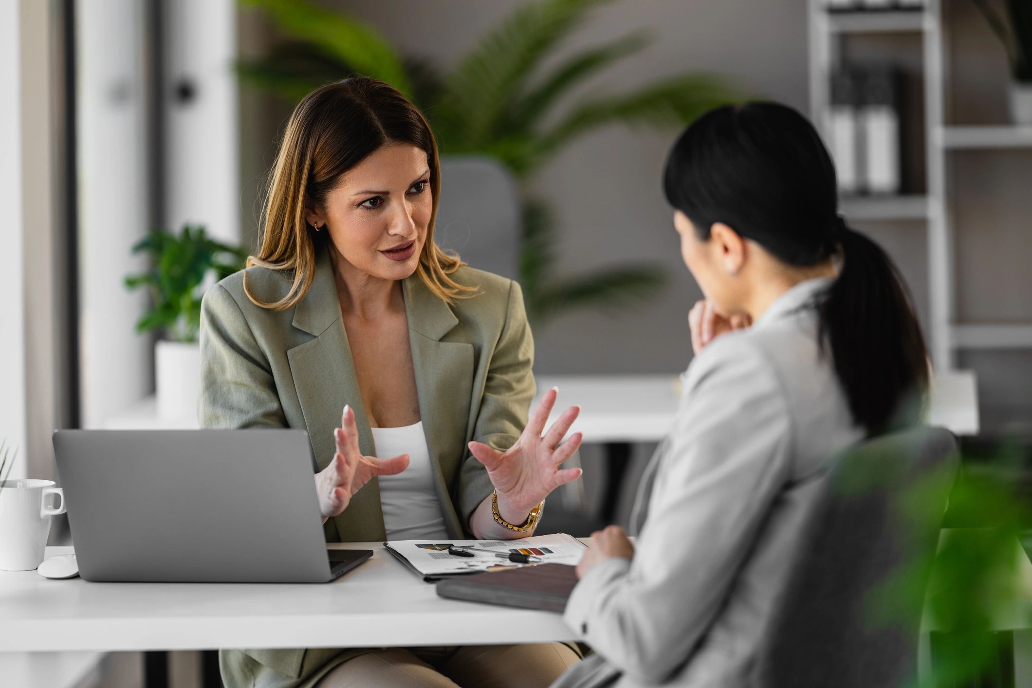 Insurance advisor consulting with a client in an office